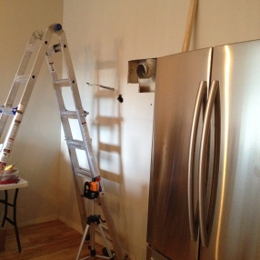 Getting a level line on the main kitchen wall.